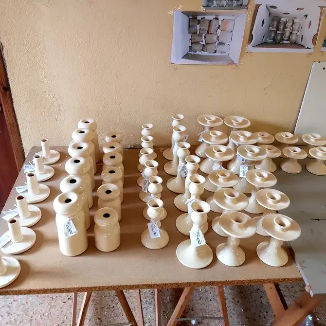 Blauwe geborstelde kaarshouder.